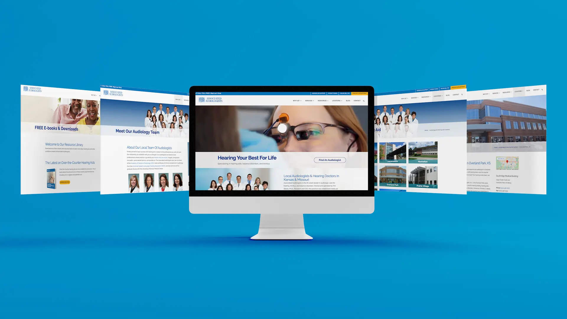 Multiple laptop views of Associated Audiologists website