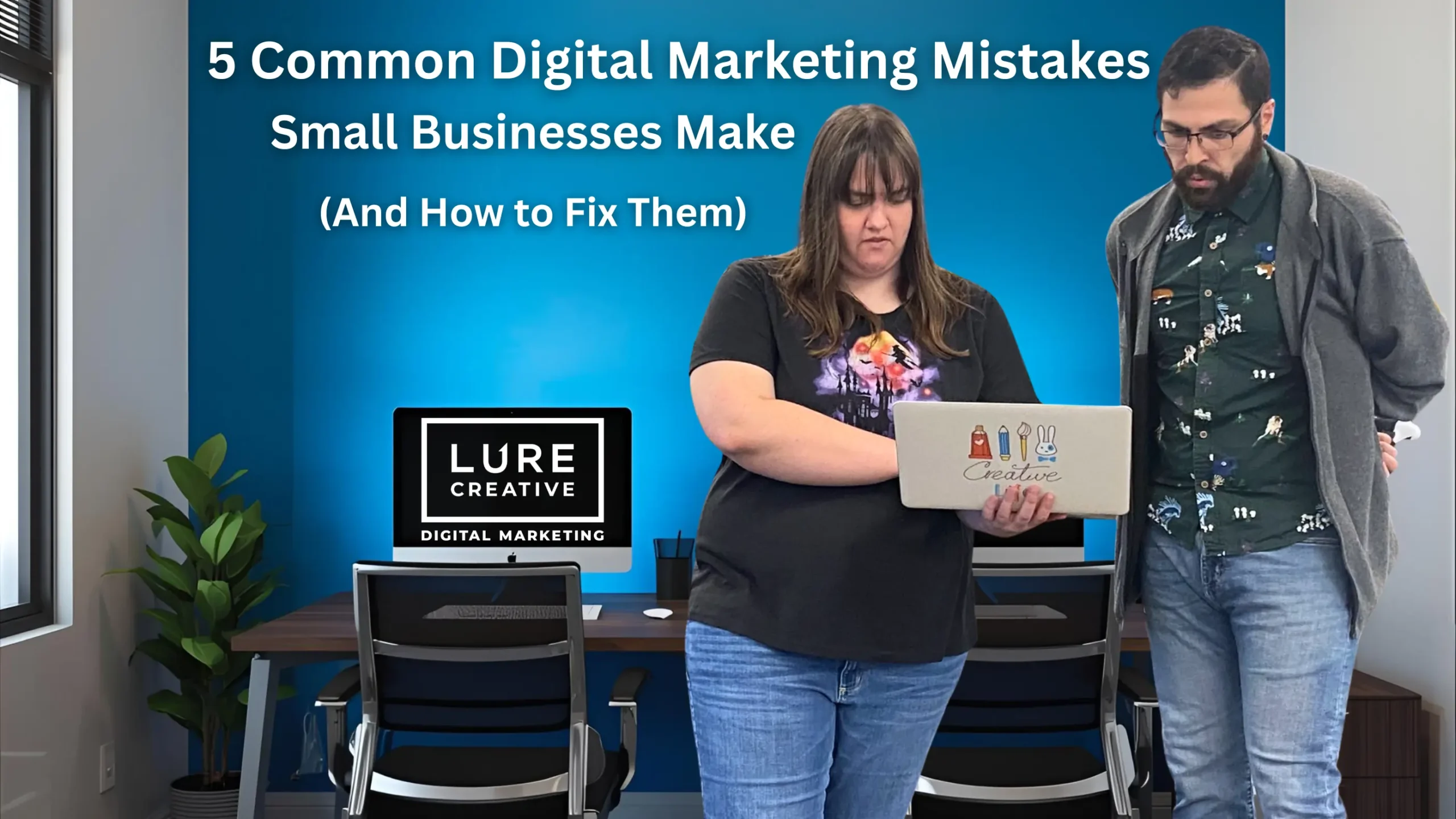 Members of the Lure Creative team collaborating in front of a display.